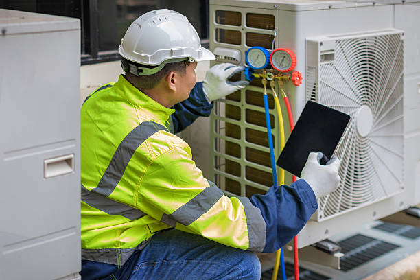 Professional Air Duct Cleaning technician working in North Weymouth, MA